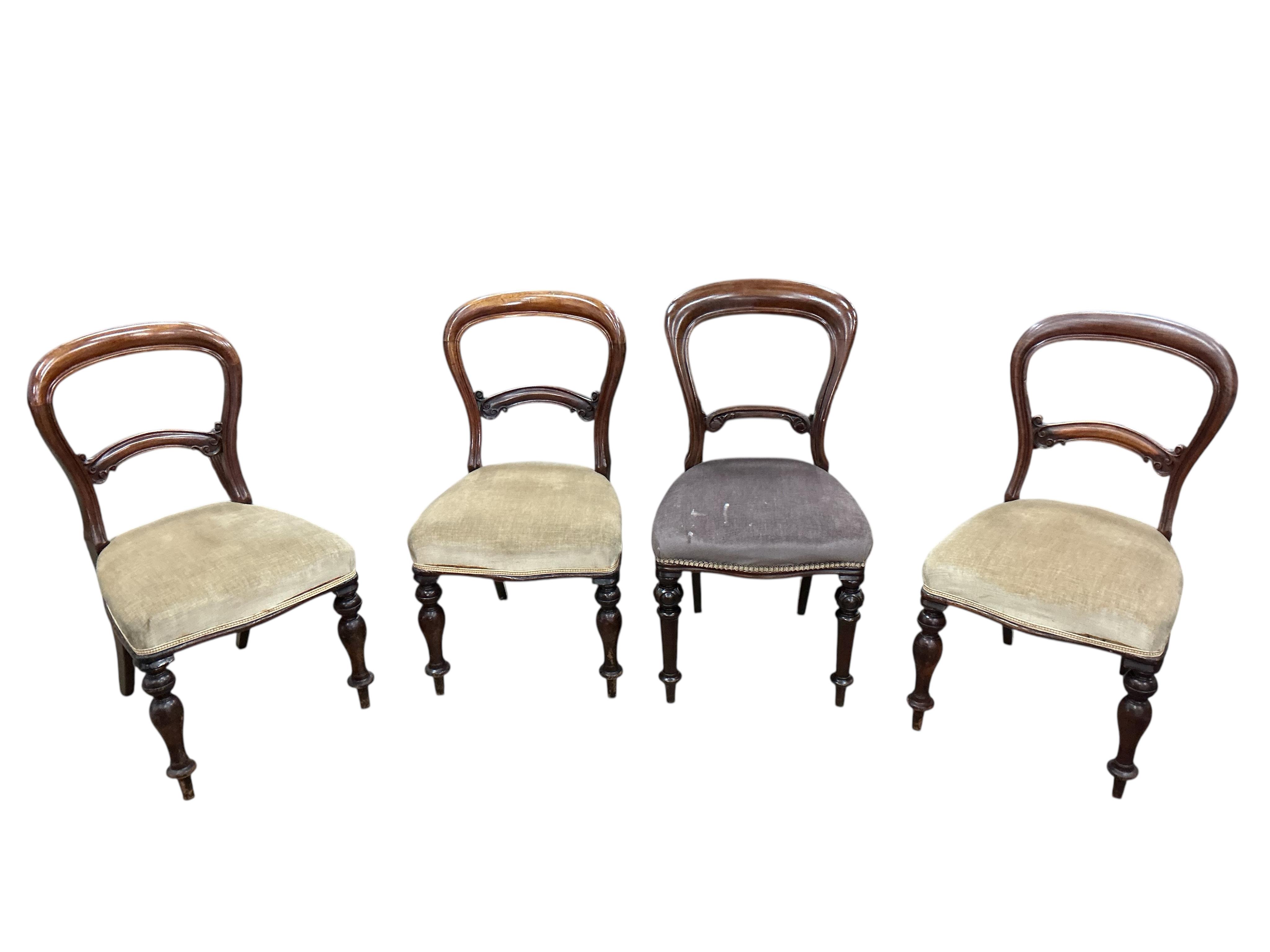 A set of eight Victorian mahogany balloon back dining chairs